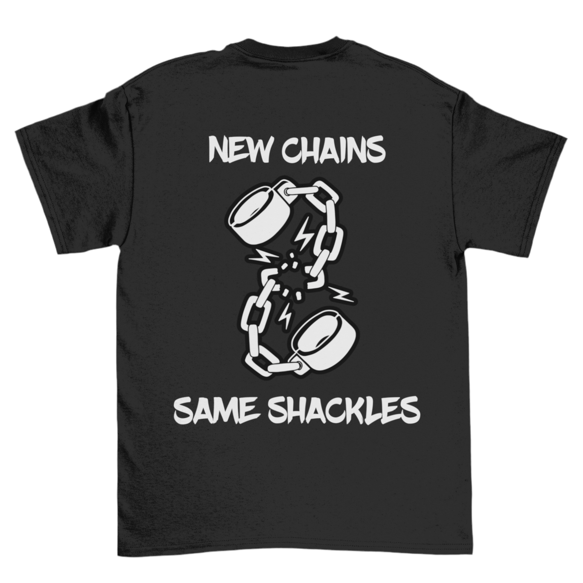 The image is of a black T-shirt featuring a design on the back. The design includes an illustration of broken shackles with lightning bolts around the break, symbolizing a sense of breaking free or resistance. The text above and below the illustration reads: “New Chains, Same Shackles”