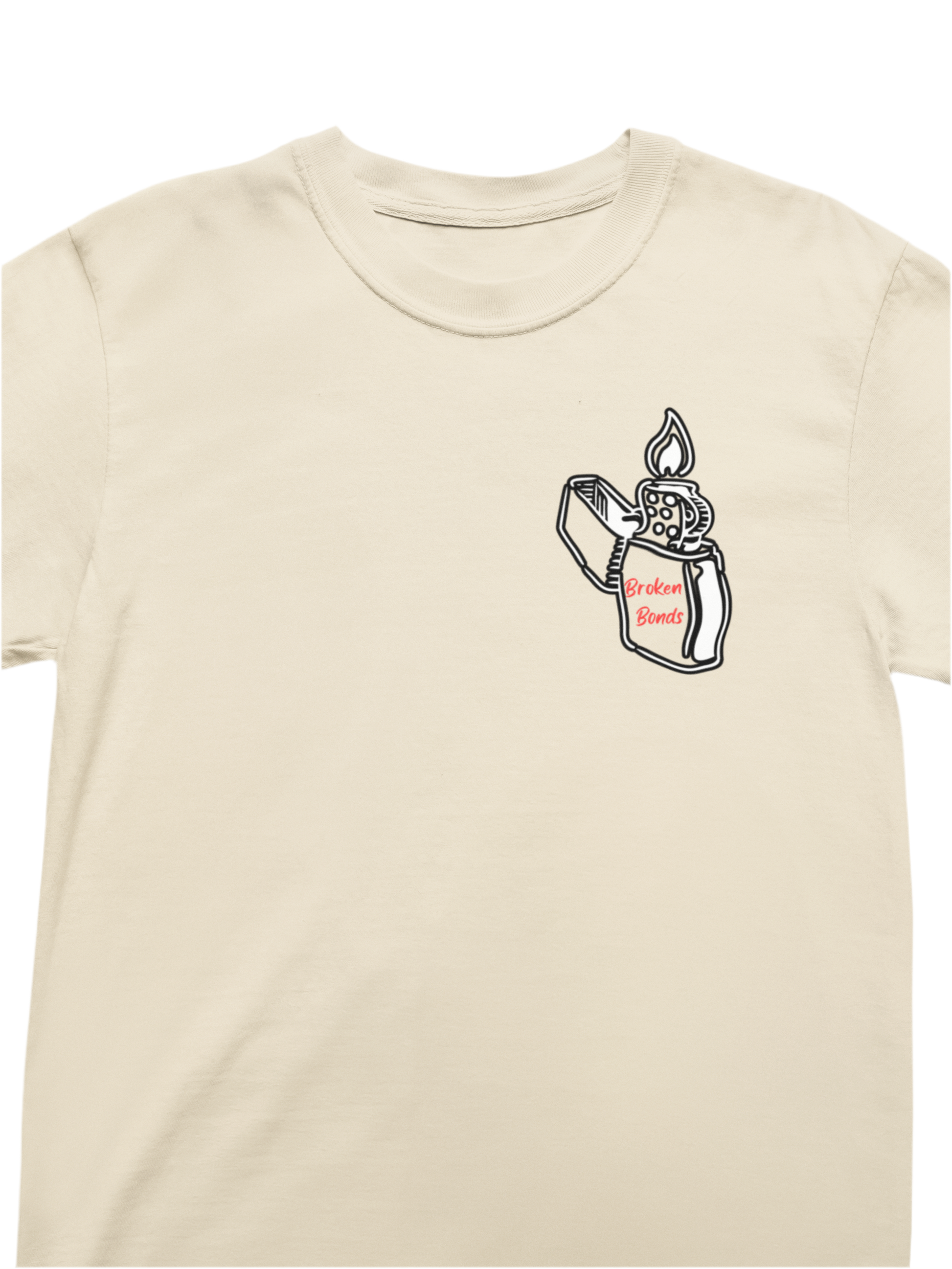 This beige T-shirt has a small graphic on the left chest area. The design features a white-outlined illustration of a flip-top lighter with a flame. On the lighter, the words “Broken Bonds” are written in red.