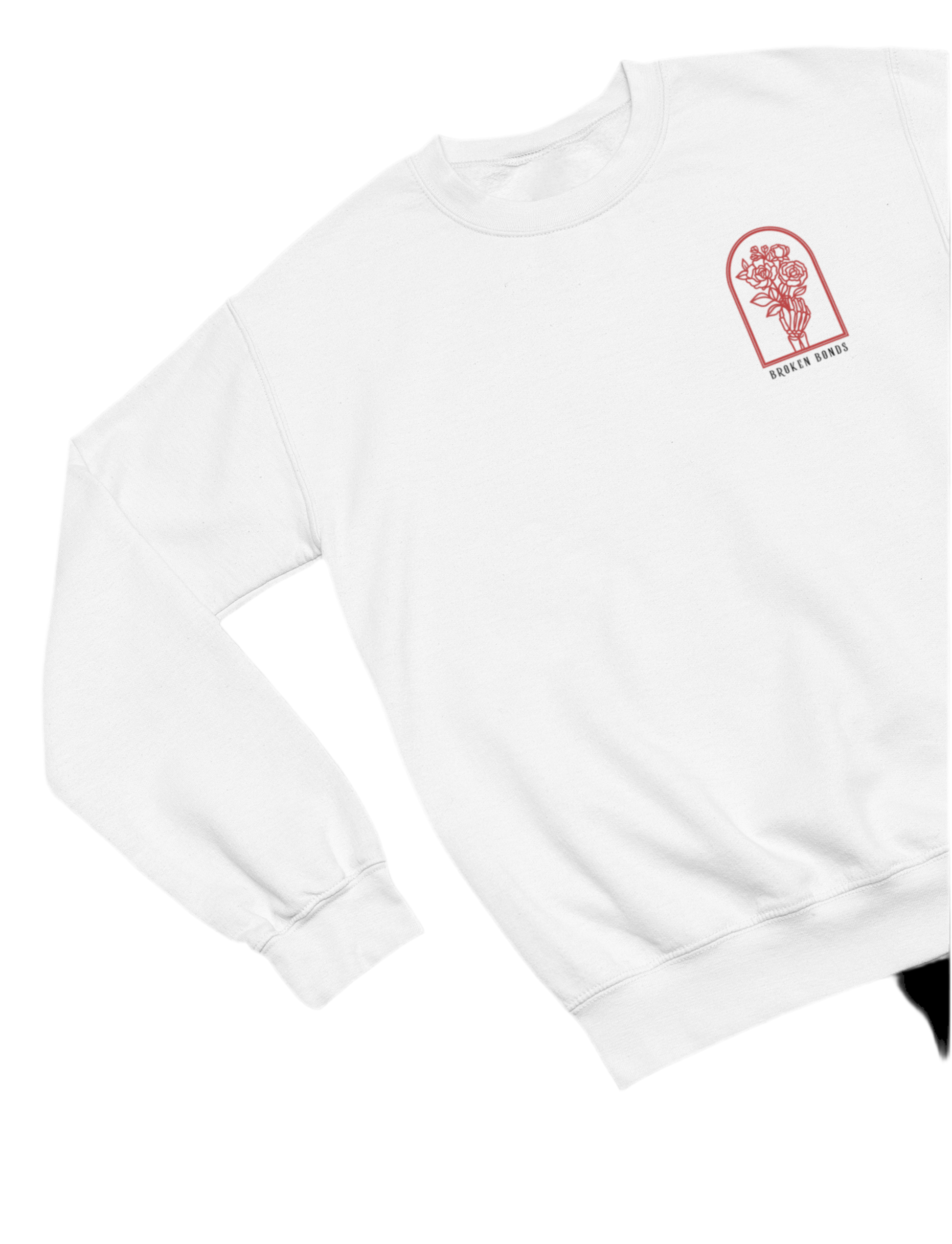 This white sweatshirt features a minimalist yet striking front design. The small chest graphic consists of a skeletal hand holding a bouquet of roses, enclosed within an arched frame. Below the artwork, the words “BROKEN BONDS” are written in a simple yet bold font. 